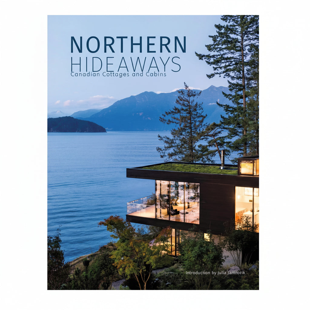 Modern cabin by a lake with mountains in the background, titled 'Northern Hideaways'.