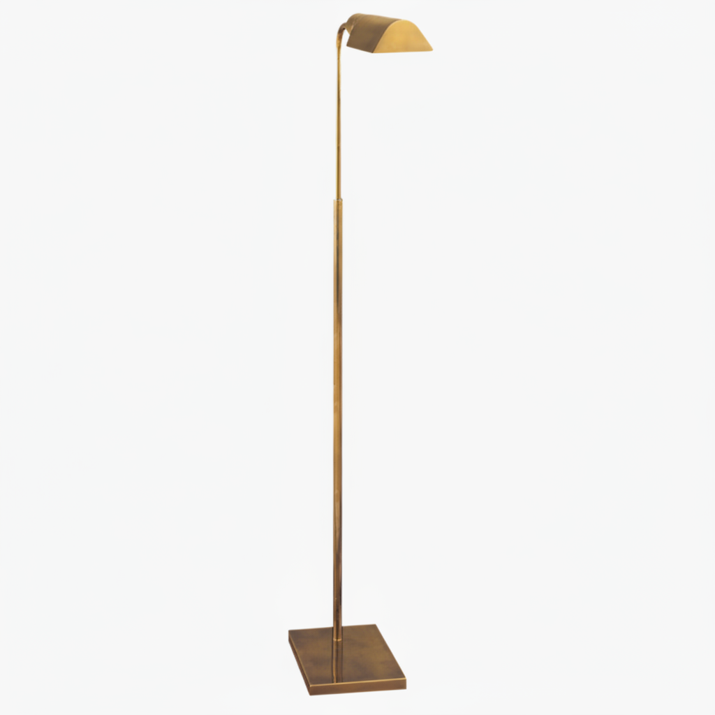 A brass adjustable floor lamp with a square base and a cylindrical shade.