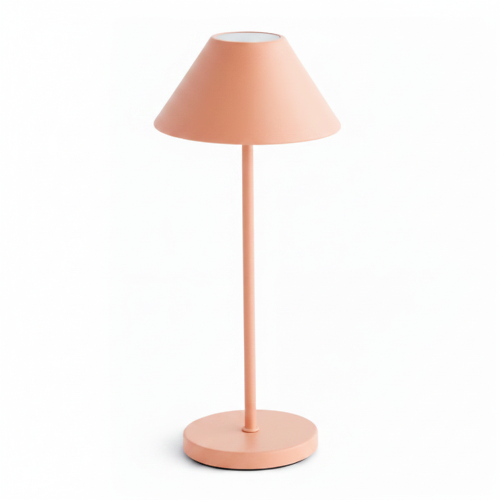 Pink table lamp with a white base on a white background